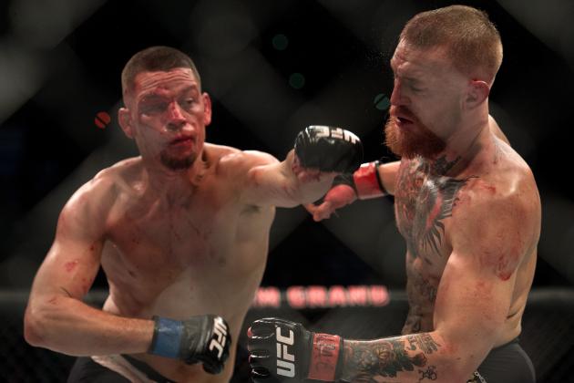 Nate Diaz lands a textbook left straight to the jawline of Conor McGregor during their action packed UFC 196 welterweight bout