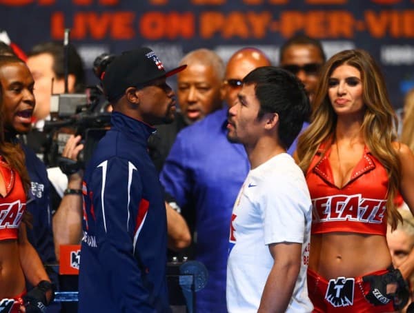 Floyd Mayweather Defeats Manny Pacquiao To Unify Belts