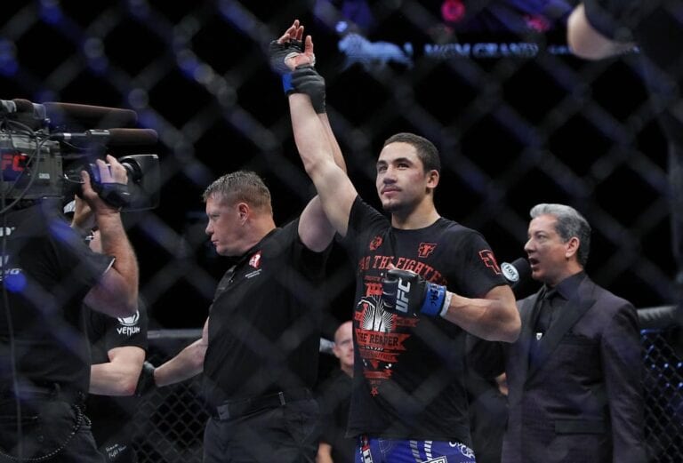 UFC Fight Night 65 Bonuses: Whittaker, Chambers Take Home $50,000