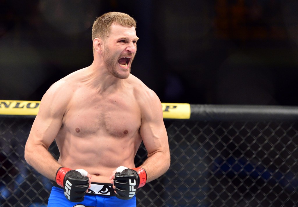 May 31, 2014; Sao Paulo, SP, BRAZIL; Stipe Miocic (red gloves) reacts after his fight against Fabio Maldonado (blue gloves) during the TUF Brazil 3 Finale at Ibirapuera Gymnasium. Mandatory Credit: Jason Silva-USA TODAY Sports