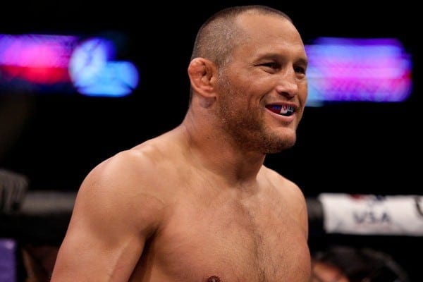 Jun 6, 2015; New Orleans, LA, USA; Dan Henderson (blue gloves) celebrates his win against Tim Boetsch (not pictured) during UFC Fight Night at the Smoothie King Center. Mandatory Credit: Derick E. Hingle-USA TODAY Sports