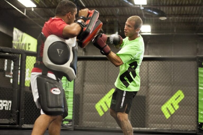 Watch Donald Cerrone Train With Miesha Tate & DESTROY The Pads