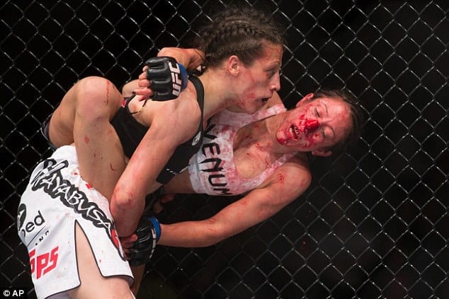 Joanna Jedrzejczyk retains UFC strawweight title by crushing ...