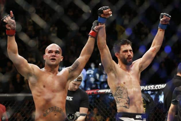 Robbie Lawler took home a split decision win against Carlos Condit. UC president <a class=