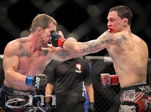 January 1, 2011; Las Vegas, NV; USA; UFC Lightweight Champion Frankie Edgar ( trunks) and challenger Gray Maynard ( trunks) fight during their UFC Lightweight championship bout at UFC 125 at the MGM Grand Garden Arena in Las Vegas. After 5 rounds the bout ended in a draw.