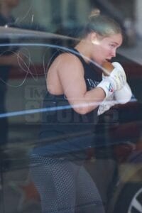 147891, EXCLUSIVE: Ronda Rousey gets ready for her upcoming fight against Miesha Tate as she heads to a training session with fiance Travis Browne in LA. Los Angeles, California - Wednesday February 10, 2016. Photograph: © PacificCoastNews. Los Angeles Office: +1 310.822.0419 sales@pacificcoastnews.com FEE MUST BE AGREED PRIOR TO USAGE