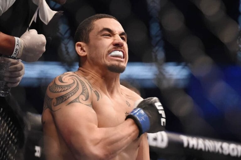 Robert Whittaker Overcomes Hand Injury To Defeat Rafael Natal