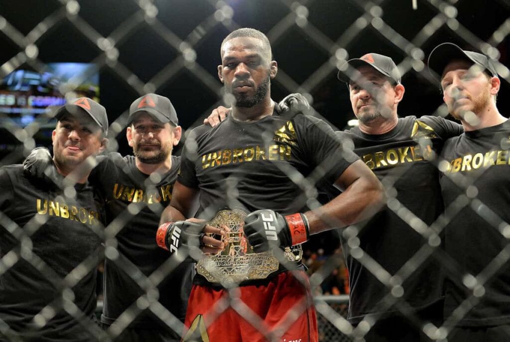 Jan 3, 2015; Las Vegas, NV, USA; Jon Jones with his corner after defeating Daniel Cormier (not pictured) in their light heavyweight title fight at UFC 182 at the MGM Grand Garden Arena. Jones won. Mandatory Credit: Jayne Kamin-Oncea-USA TODAY Sports