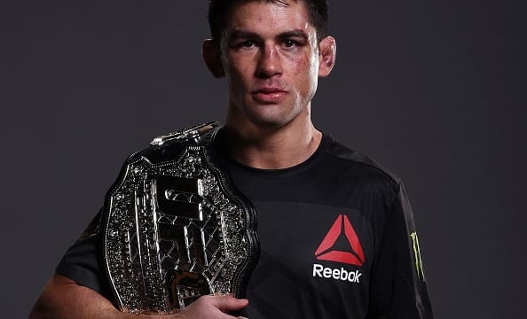 BOSTON, MA - JANUARY 17: New UFC bantamweight champion Dominick Cruz poses for a portrait backstage after his victory over TJ Dillashaw during the UFC Fight Night event inside TD Garden on January 17, 2016 in Boston, Massachusetts. (Photo by Mike Roach/Zuffa LLC/Zuffa LLC via Getty Images)