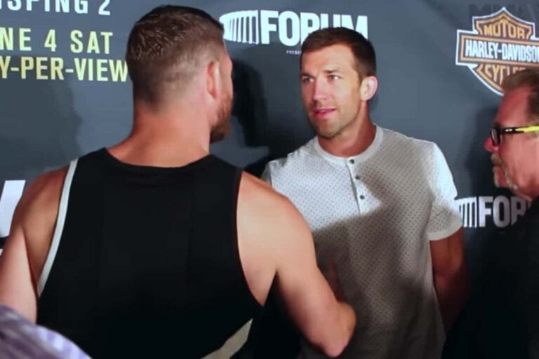 Video: Michael Bisping & Luke Rockhold Get Heated, Separated Following UFC 199
