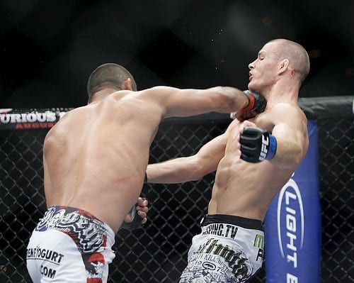 Dan Henderson, left, knocks out Michael Bisping during UFC 100 at the Mandalay Bay Events Center on July 11, 2009 in Las Vegas, Nevada. Francis Specker
