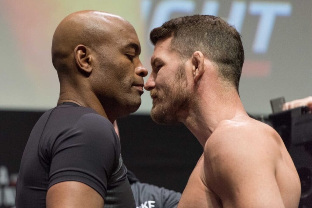 Feb 26, 2016; London, United Kingdom; Anderson Silva and Michael Bisping square off during weigh-ins for UFC Fight Night at O2 Arena. Mandatory Credit: Per Haljestam-USA TODAY Sports