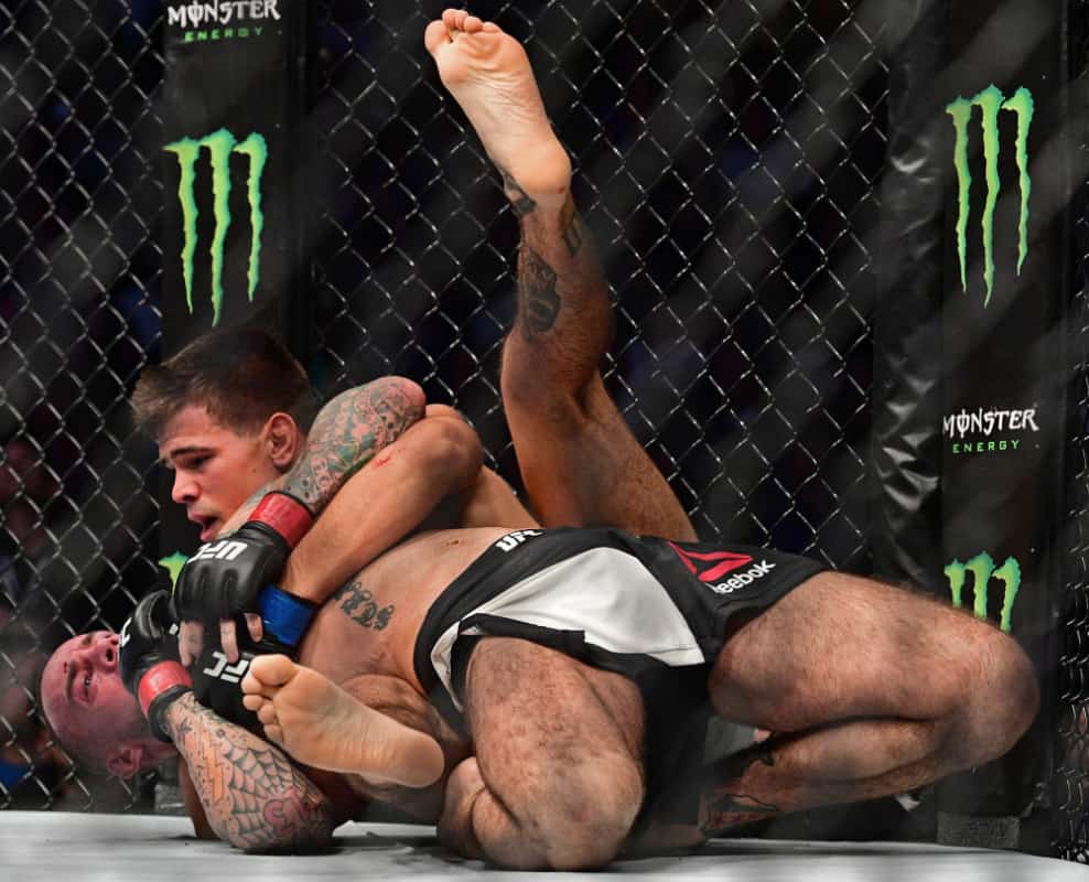 Mickey Gall wrestles CM Punk during a welterweight bout at UFC 203 on Saturday, Sept. 10, 2016, in Cleveland. (AP Photo/David Dermer) ORG XMIT: OHDD118