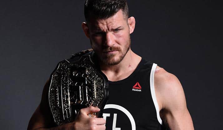 Watch Michael Bisping Crash Robert Whittaker’s Interim Title Celebration