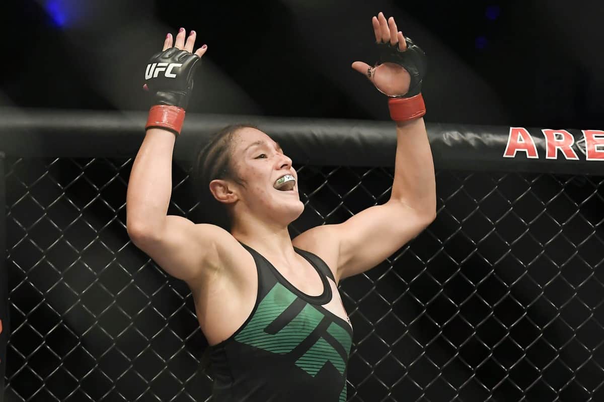 Nov 5, 2016; Mexico City, Mexico; Alexa Grasso (red gloves) defeats Heather Jo Clark (blue gloves) during UFC Fight Night at Distrito Federal. Mandatory Credit: Etzel Espinosa-USA TODAY Sports 