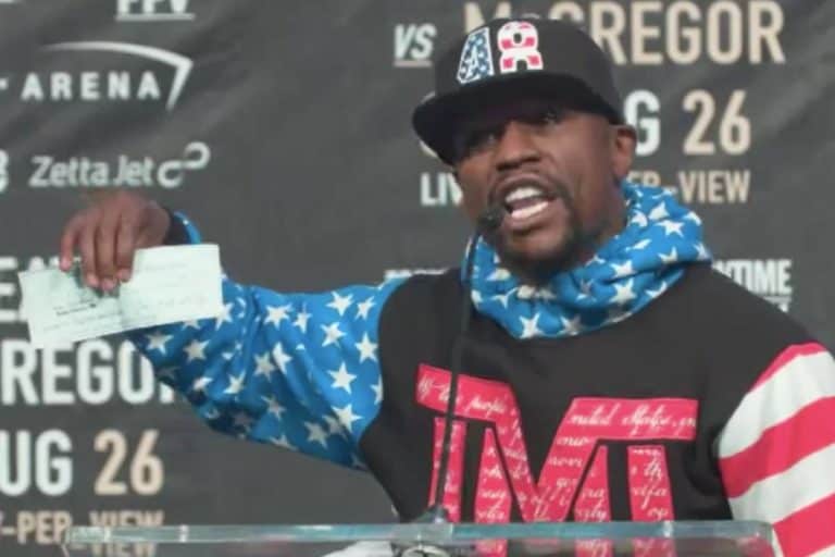 Floyd Mayweather Flaunts $100 Million Check At Press Conference