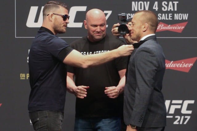 Michael Bisping and George St-Pierre face off at UFC 217 weigh-ins as the trash talk continues