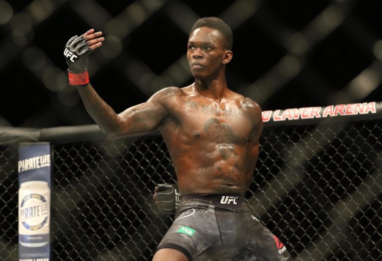 Israel Adesanya Claps Back At Chris Weidman & Paulo Costa