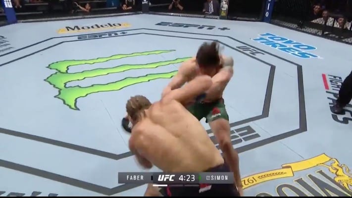 Urijah Faber runs through