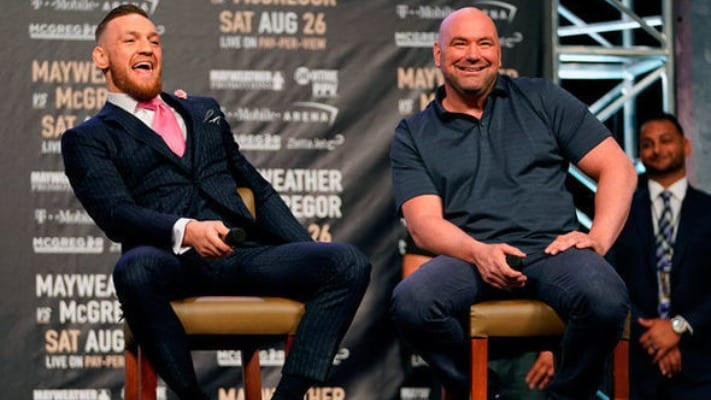 Dana White Hands Conor McGregor $50K Bonus In Cash (Photos)