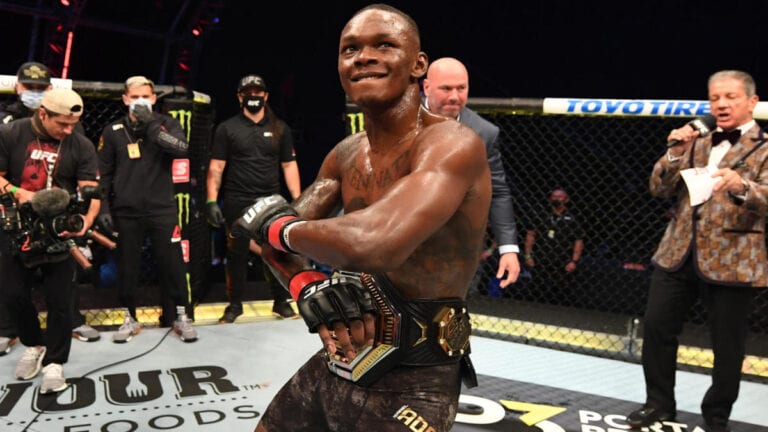 Coach Says Israel Adesanya Could Compete At 205 In Next Fight, Jones Responds