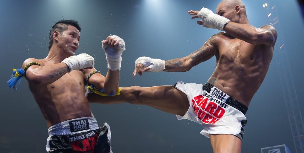 Watch: Muay Thai Fighter Asks for Break to Pop Shoulder Back Into Place Mid-Fight 2 muay thai styles