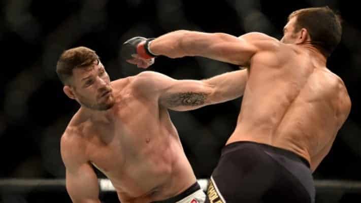 Michael Bisping Rolls With Luke Rockhold Five Years After UFC 199