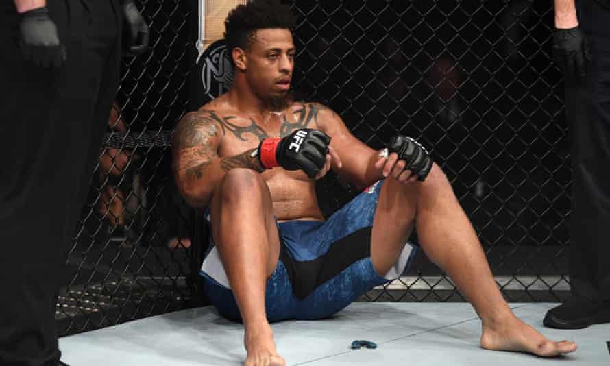 Greg Hardy contemplates his disqualification for landing an illegal knee against Allen Crowder. Photograph: Josh Hedges/Zuffa LLC/Zuffa LLC via Getty Images