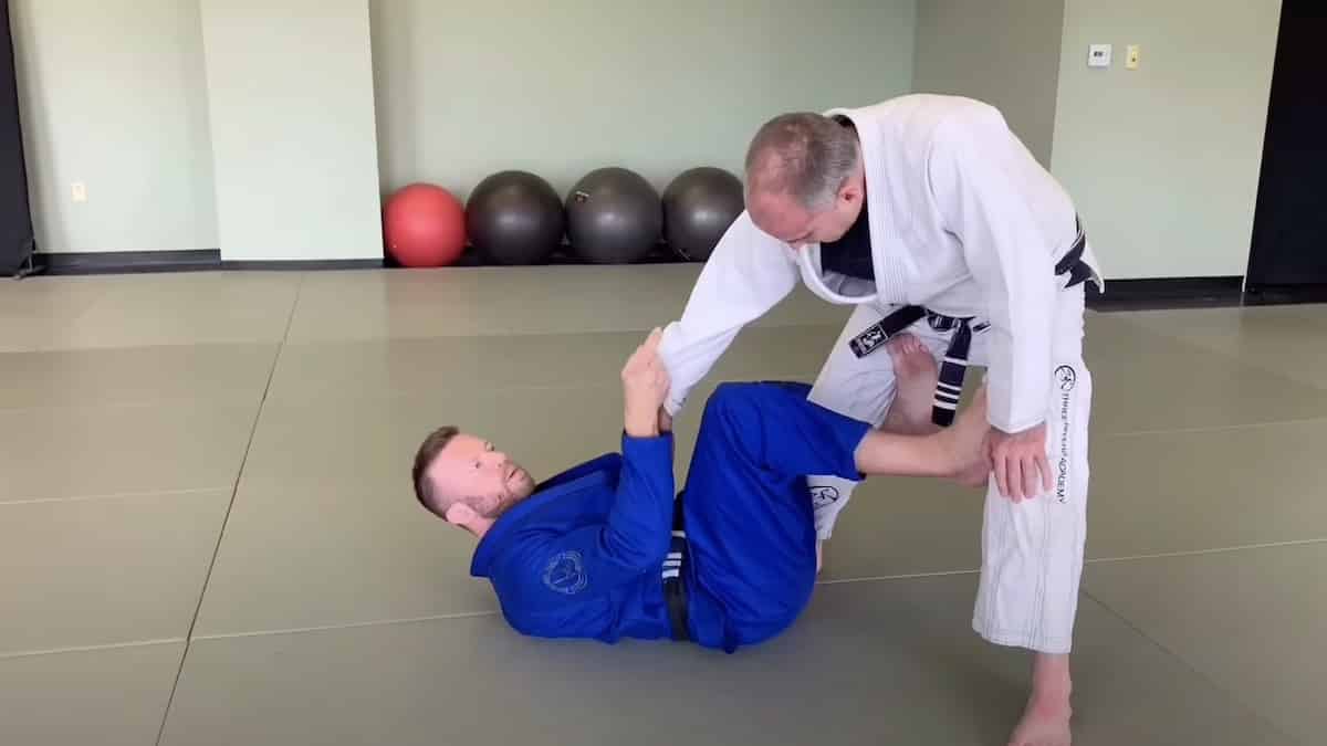 How To Do The Perfect Side Sweep From De La Riva Guard by Mikey Musumeci