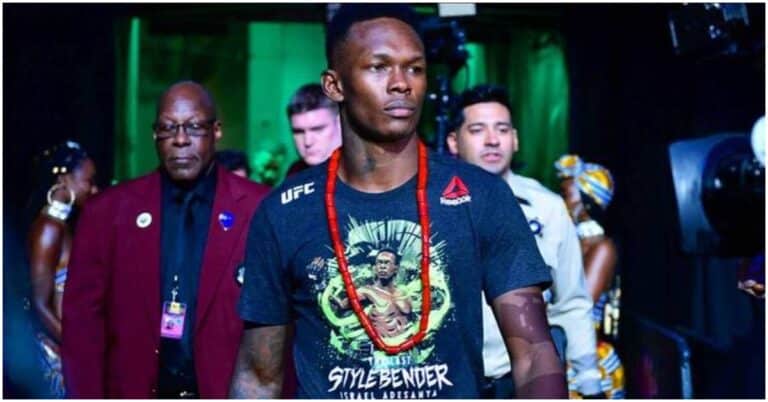 Israel Adesanya Reacts To Hooker vs. Jones Twitter Beef