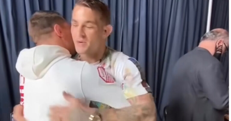 Michael Chandler and Dustin Poirier embrace ahead of UFC 281