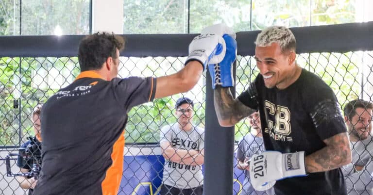 Charles Oliveira trains alongside McLaren F1 driver Daniel Ricciardo prior to Brazil Grand Prix