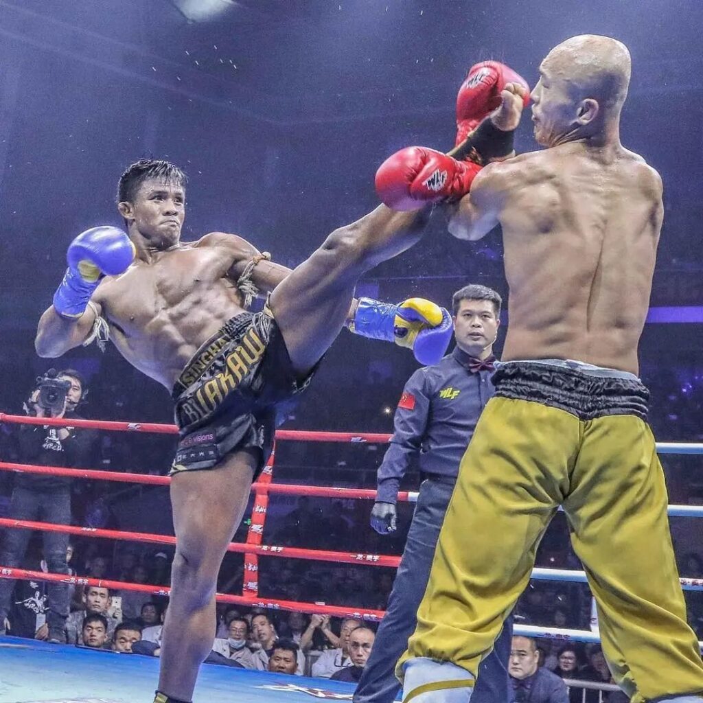 Watch: Muay Thai Fighter Asks for Break to Pop Shoulder Back Into Place Mid-Fight 3 Muay Thai