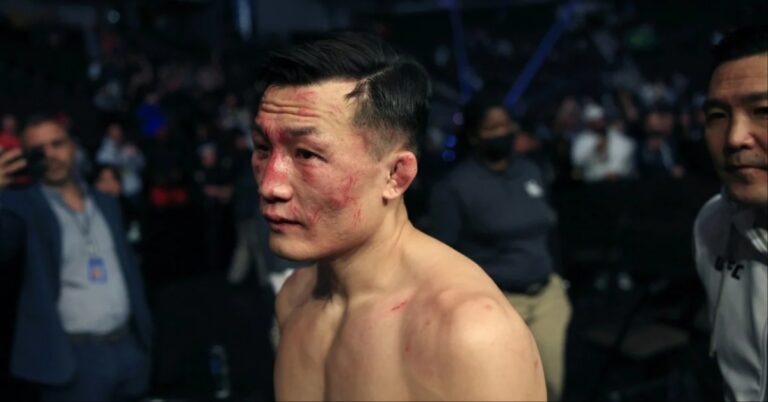 The Korean Zombie retrieves lost glove following retirement fight against Max Holloway at UFC Singapore