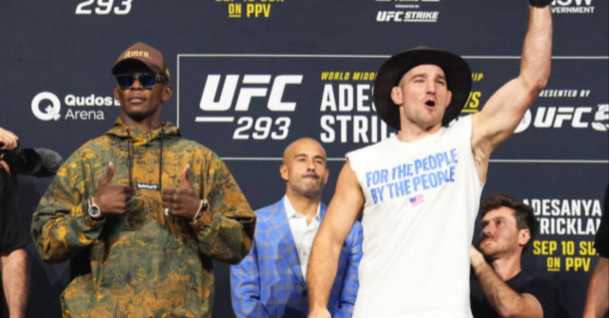 Video - Israel Adesanya awkwardly faces off with Sean Strickland amid dog touching accusations ahead of UFC 293 1 Israel Adesanya and Sean Strickland face off press conference dog touching accusations UFC 293