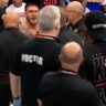 Leon Edwards held back by security after Johnny Eblen KO's his brother at Bellator 299