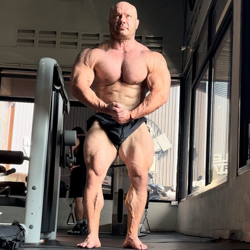 Dr. Mike Israetel: Renaissance Periodization 3 Dr Mike Israetel in gym