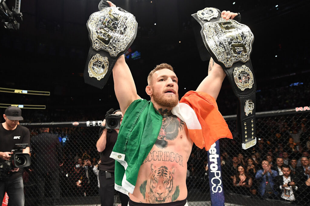 Conor McGregor becomes the first simultaneous two-division UFC champion