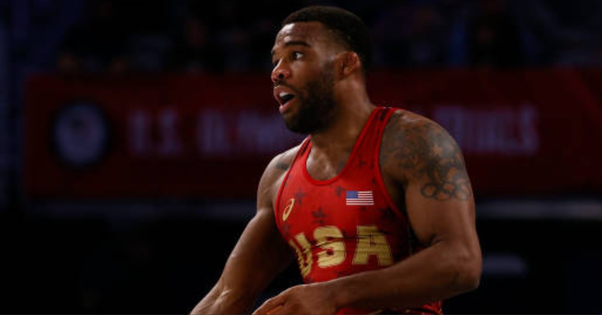 Wrestling icon Jordan Burroughs heckled by obnoxious fan following retirement match, Daniel Cormier reacts