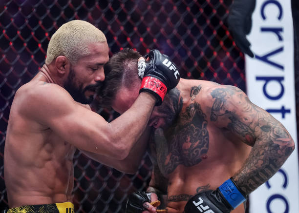 Cody Garbrandt suffered from vertigo during his UFC 300 fight with Deiveson Figueredo 4 Cody Garbrandt is consoled by Figueiredo