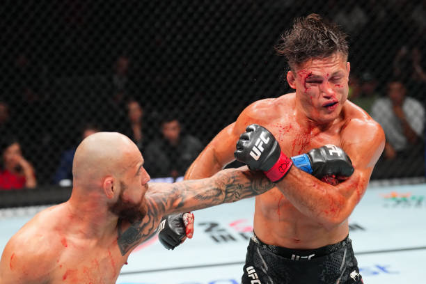 Jean Silva forces bloody doctor's stoppage win over Drew Dober in Fight of the Night - UFC Denver Highlights 3 silva dober