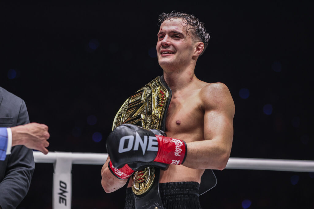 Johnathan Di Bella Dominates Sam-A to win Interim Kickboxing title - ONE 172 Results 2 John Di Bella with World title belt