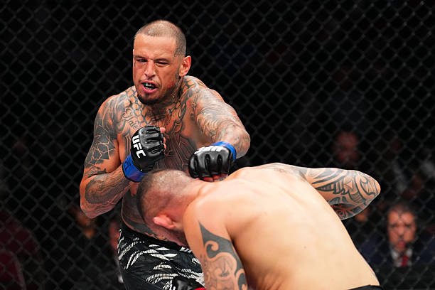 Daniel Rodriguez Sleeps Santiago Ponzinibbio with Vicious Left Hand - UFC Des Moines Highlights 4 gettyimages 2213281499 612x612 1