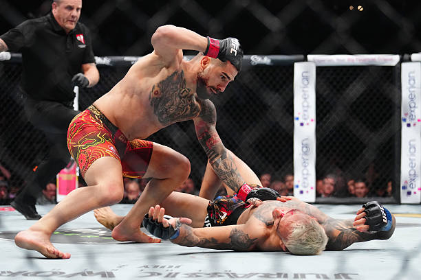 History Made! Ilia Topuria Crushes Charles Oliveira with Vicious KO to Claim Lightweight Title - UFC 317 Highlights 12 gettyimages 2222690337 612x612 1