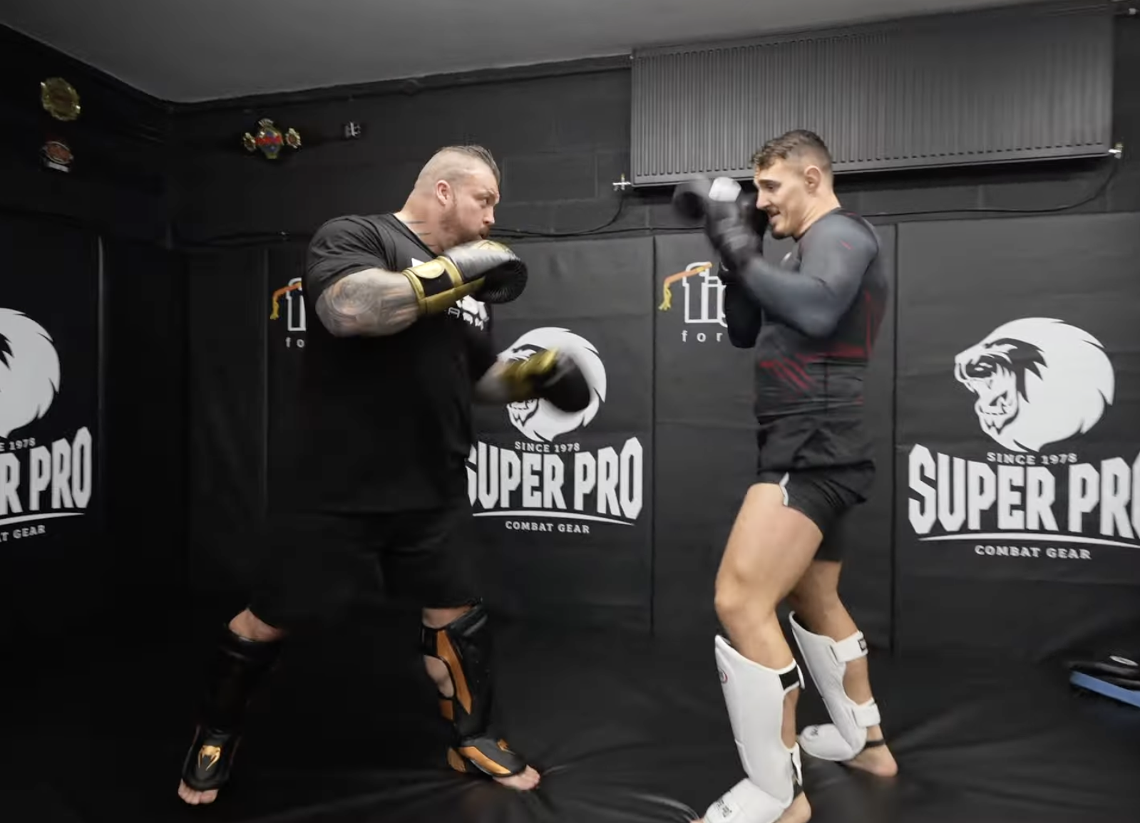 Watch: Eddie Hall Take Out UFC Heavyweight Champ Tom Aspinall In the Gym