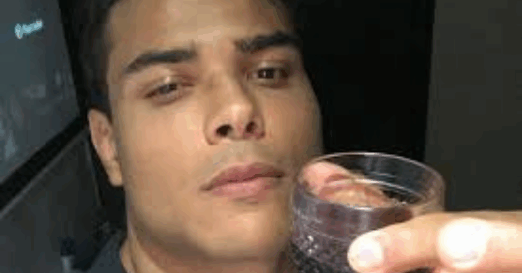 Paulo Costa drinking Wine