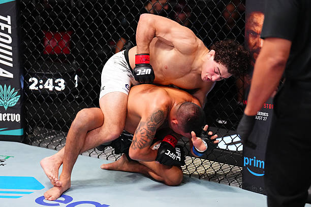 Austin Bashi Chokes Out John Yannis in Opening Round - UFC Vegas 108 Highlights 3 gettyimages 2228247720 612x612 1