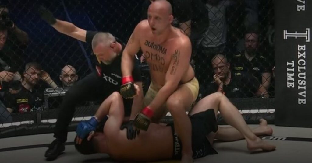 Paweł Pawlak Pounds His Way to Successful Title Defense Against Mamed Khalidov - KSW 117 Highlights