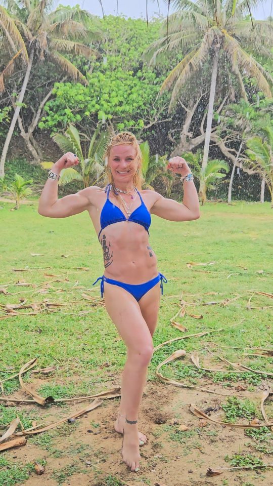 Valentina Shevchenko flexing in bikini